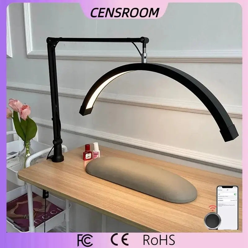 Arch Nail Table Lamp with adjustable arm and half moon light design for beauty salon and manicure use.